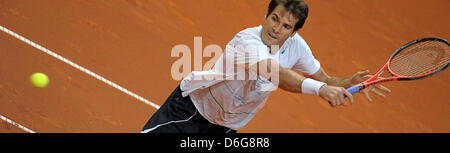 German tennis player Tommy Haas plays the ball during the Davis Cup tennis double's match with teammate Petzschner against Argentina at Stechert Arena in Bamberg, Germany, 11 February 2012. From 10 to 12 February, the Davis Cup first round matches Germany vs Argentina will be played in Bamberg. Photo: David Ebener Stock Photo