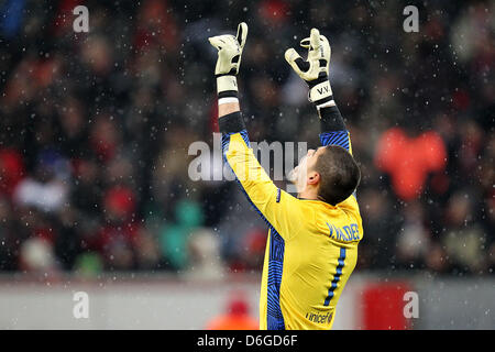 Barcelona's goalkeeper Victor Valdes cheers after the 0-1 goal during the UEFA Champions League match between Bayer Leverkusen and FC Barcelona at the BayArena in Leverkusen, Germany, 14 February 2012. Photo: Revierfoto Stock Photo