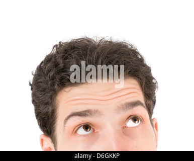 Portrait of a young handsome man looking up. Isolated on white background Stock Photo