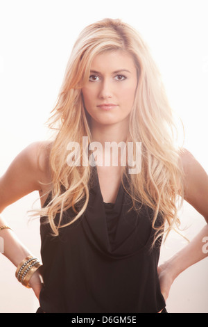 Woman wearing black top Stock Photo
