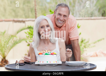 Older couple celebrating birthday Stock Photo