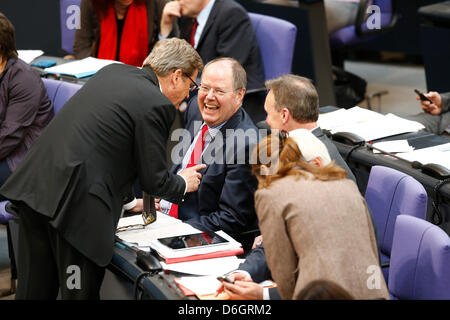Germany, Berlin. 18th April, 2013. German Finance Minister Wolfgang Schaeuble gives statement on government financial support to Cyprus. / Plenary meeting of the Federal Parliament of 18 April 2013 with the participation of Chancellor Angela Merkel / Guido Westerwelle (FDP), German Foreign Minister, and Peer Steinbrück (SPD) talking at bundestag. Credit: Reynaldo Chaib Paganelli/Alamy Live News