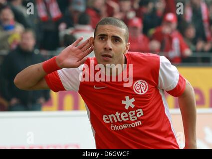 Mainz's Mohamed Zidan celebrates his 1-0 goal during the German Bundesliga match between 1. FSV Mainz 05 and 1. FC Kaiserslautern at the Coface Arena in Mainz, Germany, 25 February 2012. Photo: ROLAND HOLSCHNEIDER  (ATTENTION: EMBARGO CONDITIONS! The DFL permits the further utilisation of the pictures in IPTV, mobile services and other new technologies only no earlier than two hour Stock Photo