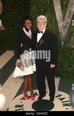 Director George Lucas and wife Mellody Hobson attend the 2012 Vanity Fair Oscar Party at Sunset Tower in Los Angeles, USA, am 26 Februar 2012. Photo: Hubert Boesl Stock Photo