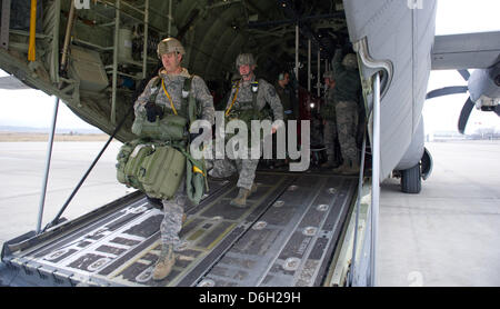 (FILE) An archive photo dated 23 February 2012 shows US Army paratroopers leaving a US Air Force transport aircraft at the air base in Rammstein, Germany, 23 February 2012. Rammstein Air Base is the most important hub of the US Military for international transport and cargo flights. It is the largest US Air Force Base outside of the United States and the largest NATO air base in Eu Stock Photo