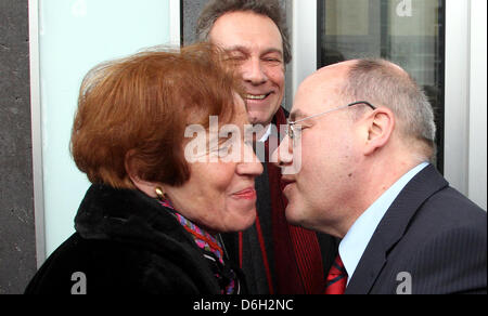 Fractionleader of the Left Party Gregor Gysi (R) welcomes presidential candidate Beate Klarsfeld before a press conference in front of the Federal Press Conference building in Berlin, Germany, 29 February 2012. In the background party leader Klaus Ernst can be seen. Photo: WOLFGANG KUMM