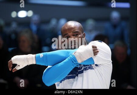 French heavyweight boxer Jean-Marc Mormeck warms up during a public training session in a car dealership in Duesseldorf, Germany, 29 February 2012. Mormeck will fight W. Klitschko on 03 MArch 2012. Photo: ROLF VENNENBERND Stock Photo