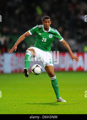 Germany's Jerome Boateng plays the ball during the international friendly soccer match Germany vs France at the Weser stadium in Bremen, Germany, 29 February 2012. Photo: Thomas Eisenhuth Stock Photo