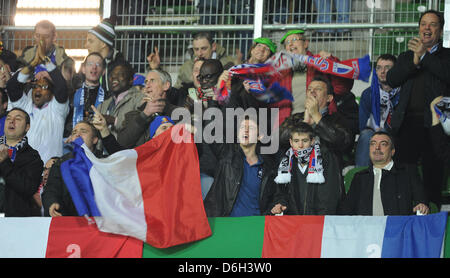 Supporters of France celebrate before the international friendly soccer match between Germany and France at the Weser Stadium in Bremen, Germany, 29 February 2012. Photo: Marcus Brandt Stock Photo