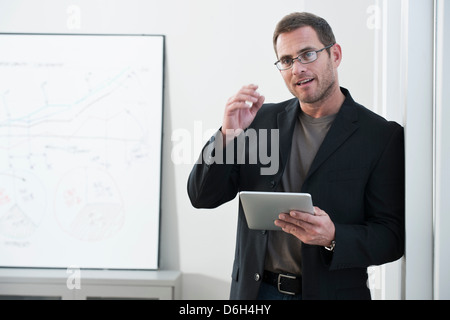 Businessman using tablet computer Stock Photo