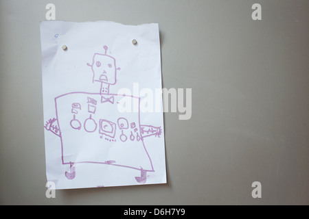 Child's artwork on refrigerator door Stock Photo