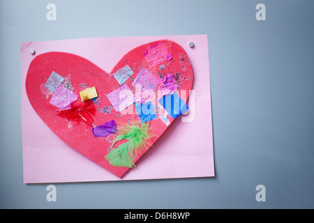 Child's artwork on refrigerator door Stock Photo