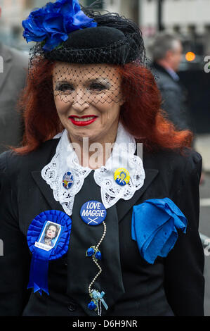 Ludgate Circus, London, UK, 17 April 2013.The Funeral of Baroness Thatcher passes through Ludgate Circus where protestors mingle with mourners.Credit: Guy Bell/Alamy Live News Stock Photo