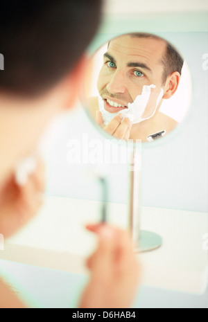 Man shaving Stock Photo