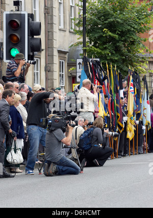 Members of the press wait with the public as servicemen are repatriated and driven through the town of Wootton Bassett.10/7/09 Stock Photo