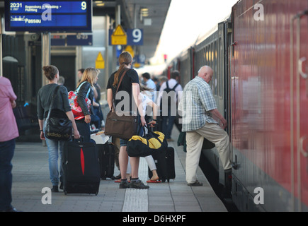 Nuernberg, Germany, passengers board a train station in Nuremberg Stock Photo