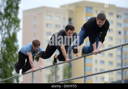 Potsdam, Germany, parkour athlete practicing in a high-rise estate Potsdamer Stock Photo