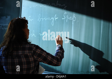 Berlin, Germany, a teacher at the blackboard Stock Photo