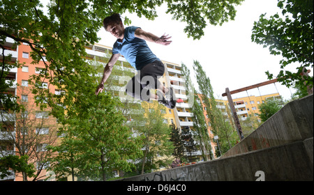 Potsdam, Germany, parkour athlete practicing in a high-rise estate Potsdamer Stock Photo