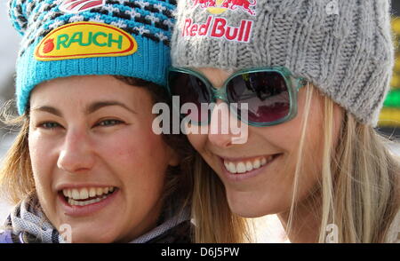 US skier Resi Stiegler (L) celebrates her second place with US skier Lindsey Vonn after the women's slalom event at the Alpine Skiing World Cup in Ofterschwang, Germany, 04 March 2012. Photo: STEPHAN JANSEN Stock Photo