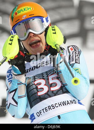 US skier Resi Stiegler celebrates after the first run of the women's slalom event at the Alpine Skiing World Cup in Ofterschwang, Germany, 04 March 2012. Photo: Stephan Jansen Stock Photo