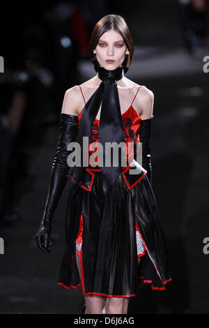 A model wears a creation by French label Givenchy as part of the women's ready to wear fall/winter 2012/2013 collection presented during the Paris Pret-a-Porter fashion week, in Paris, France, 4 March 2012. The Pret-a-Porter women's fashion fall/winter runs until 7 March 2012. Photo: Hendrik Ballhausen Stock Photo