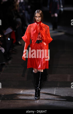 A model wears a creation by French label Givenchy as part of the women's ready to wear fall/winter 2012/2013 collection presented during the Paris Pret-a-Porter fashion week, in Paris, France, 4 March 2012. The Pret-a-Porter women's fashion fall/winter runs until 7 March 2012. Photo: Hendrik Ballhausen Stock Photo