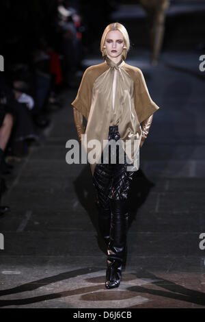 A model wears a creation by French label Givenchy as part of the women's ready to wear fall/winter 2012/2013 collection presented during the Paris Pret-a-Porter fashion week, in Paris, France, 4 March 2012. The Pret-a-Porter women's fashion fall/winter runs until 7 March 2012. Photo: Hendrik Ballhausen Stock Photo