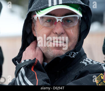 Head coach of the German team Uwe Muessiggang smiles during the women's training session of the biathlon world championships at the Chiemgau Arena in Ruhpolding, Germany, 08 March 2012. Photo: PETER KNEFFEL Stock Photo