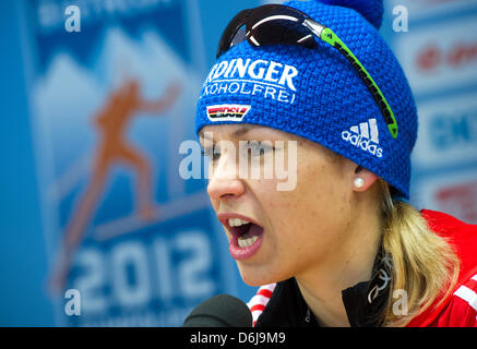 German biathlete Magdalena Neuner attends a press conference of the Biathlon World Championships at Chiemgau Arena in Ruhpolding, Germany, 09 March 2012. Photo: PETER KNEFFEL Stock Photo