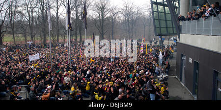 The teams of Dynamo Dresden present themselves to their fans on a balcony after the 2nd Bundesliga match SG Dynamo Dresden vs FC Ingolstadt at Gluecksgas-Stadium in Dresden, Germany, 11 March 2012. The German Football Association (DFB) punished Dynamo Dresden with a ghost game and a 100,000 euro money fine, after several riots initiated by fans occured after soccer games. Photo: Ar Stock Photo
