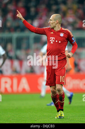 Bayern's Arjen Robben celebrates after scoring the 1-0 during the Champions League round of 16 second leg soccer match between FC Bayern Munich and FC Basel at Allianz Arena in Munich, Germany, 13 March 2012. Photo: Marc Mueller dpa/lby  +++(c) dpa - Bildfunk+++ Stock Photo