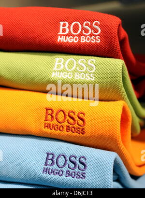 FILE - An archive picture dated 12 April 2010 shows T-Shirts by Hugo Boss at the company's headquarters in Metzingen, Germany. Hugo Boss presents its annual results for 2001 at a press conference on 14 March 2012. Photo: Bernd Weissbrod Stock Photo