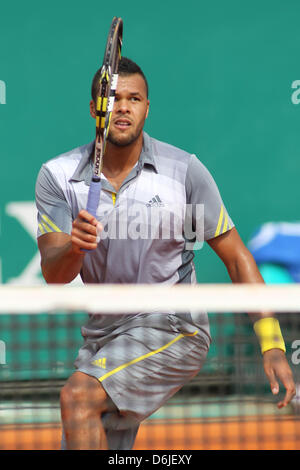 MONTE CARLO, MONACO - APRIL 19 2013: Jo-Wilfried Tsonga of France in action during the quarter final match against Stanislas Wawrinka of Switzerland (not pictured) on day five of the ATP Monte Carlo Masters, at Monte-Carlo Sporting Club on April 19, 2013 in Monte-Carlo, Monaco. (Photo by Mitchell Gunn/ESPA/Alamy Live News) Stock Photo