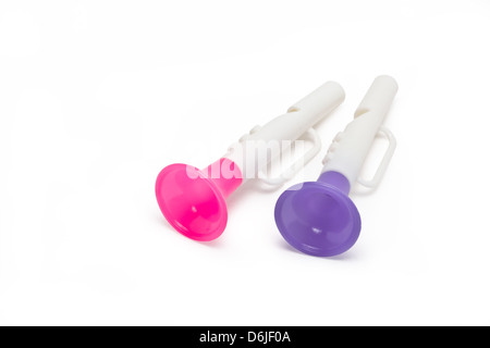 Children horn made of colored plastic isolated on white background. Stock Photo