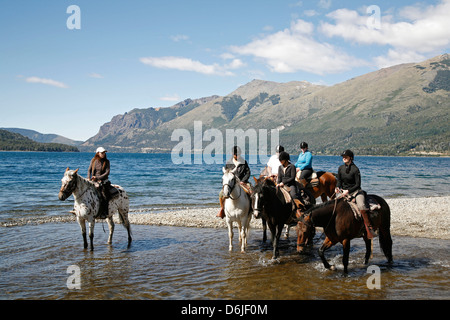 Horseback riding by Guttierez Lake in Estancia Peuma Hue, Patagonia, Argentina, South America