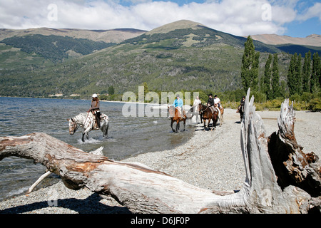 Horseback riding by Guttierez Lake in Estancia Peuma Hue, Patagonia, Argentina, South America
