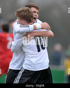 Germany's Maximilian Dittgen (L) celebrates his 2-0 goal with Max Meyer, who scored the 1-0 goal, during the European U-17 Football Championship elite round qualification match between Germany and Turkey at Sportpark Vinnenweg in Bremen, Germany, 20 March 2012. Photo: CARMEN JASPERSEN Stock Photo