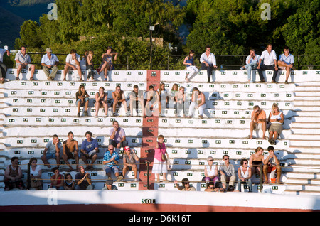 Spectators at a Bullfight in Mijas Pueblo, in Southern Spain, Andalusia. Stock Photo