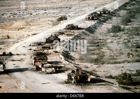 Iraqi Army armored vehicles destroyed while retreating line Highway 8 during the Gulf War April 8, 1991 in Mutla Ridge, Kuwait. The highway known as the highway of death after American and Canadian aircraft destroyed more than 1,400 vehicles. Stock Photo
