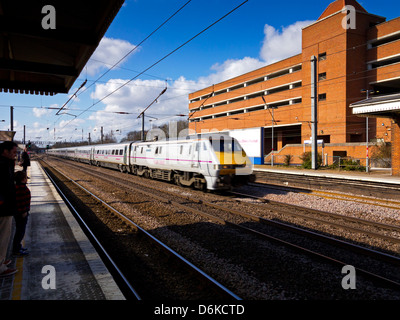 High Speed Train passing through Welwyn Garden City railway station Herfordshire England UK on the East Coast mainline Stock Photo