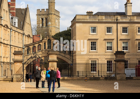 Tourists being photographed in front of the Bridge of Sighs and Hertford College in Oxford England UK Britain Stock Photo