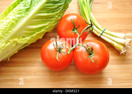 Fresh Romaine Lettuce with Three Tomatoes and Scallions
