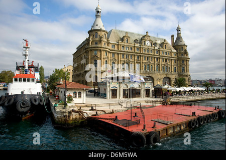 Ferry boat landing on the Asian side of the Bosporus Sea in Istanbul, Turkey near old train station Stock Photo