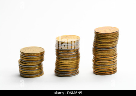coins piles isolated on white background Stock Photo - Alamy