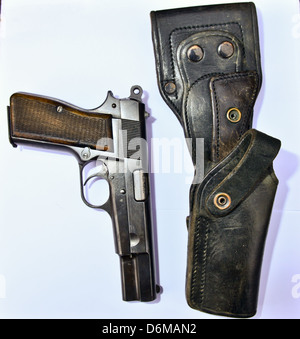 Original Browning high power  9mm pistol and it's original Len Dixon made leather holster Stock Photo