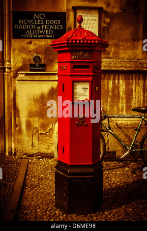 Grade II listed Penfold hexagonal letter box situated King's Parade. King's College. Cambridge. Stock Photo