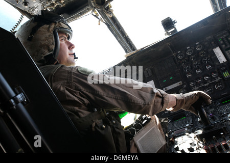 A US Marine pilot flies a CH-53E Super Stallion aircraft during operations April 10, 2013 in Helmand province, Afghanistan. Stock Photo