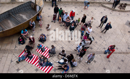 Crowd watching Punch and Judy show, Brighton Stock Photo