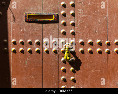 Detail of wooden front door in Morocco, North Africa Stock Photo